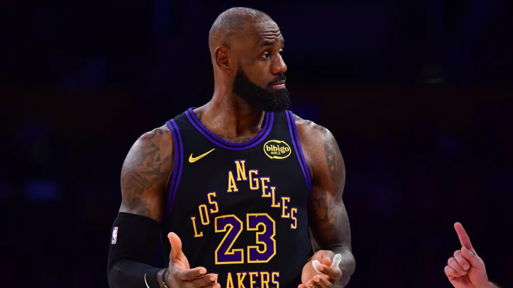 Dec 30, 2025; Los Angeles, California, USA; Los Angeles Lakers forward LeBron James (23) reacts during the second half at Crypto.com Arena. Mandatory Credit: Gary A. Vasquez-Imagn Images