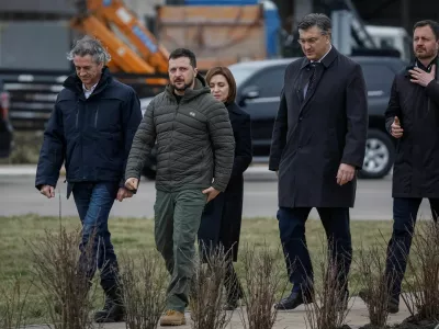 Slovenia's Prime Minister Robert Golob, Ukraine's President Volodymyr Zelenskiy, Moldovan President Maia Sandu, Croatian Prime Minister Andrej Plenkovic and Slovakian Prime Minister Eduard Heger arrive to a ceremony to marked the first anniversary of liberation the town of Bucha, as Russia's invasion of Ukraine continues, outside Kyiv, Ukraine March 31, 2023. REUTERS/Gleb Garanich
