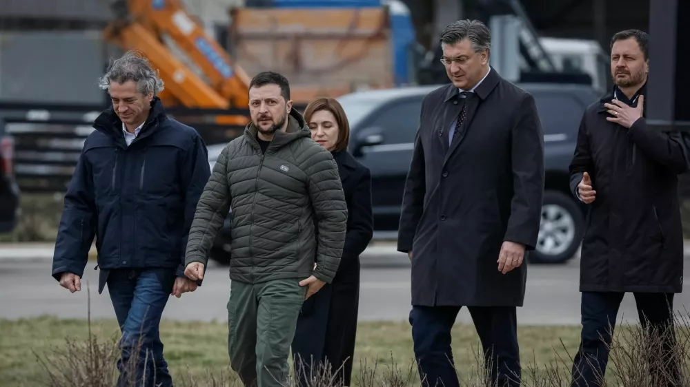 Slovenia's Prime Minister Robert Golob, Ukraine's President Volodymyr Zelenskiy, Moldovan President Maia Sandu, Croatian Prime Minister Andrej Plenkovic and Slovakian Prime Minister Eduard Heger arrive to a ceremony to marked the first anniversary of liberation the town of Bucha, as Russia's invasion of Ukraine continues, outside Kyiv, Ukraine March 31, 2023. REUTERS/Gleb Garanich