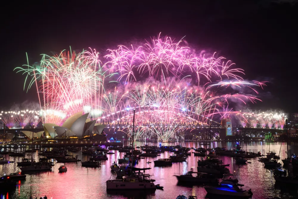 01 January 2026, Australia, Sydney: Fireworks are seen over Sydney Harbour during the New Year's Eve midnight display, at Mrs Macquaries Point in Sydney. Photo: Dan Himbrechts/AAP/dpa