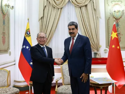 Venezuela's President Nicolas Maduro and Special Representative of the Chinese Government on Latin American Affairs Qiu Xiaoqi meet at the Miraflores Palace, in Caracas, Venezuela January 2, 2026. Marcelo Garcia/Miraflores Palace/Handout via REUTERS ATTENTION EDITORS - THIS IMAGE HAS BEEN SUPPLIED BY A THIRD PARTY