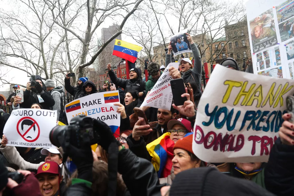 People protest outside Manhattan Federal Court before the arraignment of Venezuelan President Nicolas Maduro, Monday, Jan. 5, 2026, in New York. (AP Photo/Heather Khalifa)