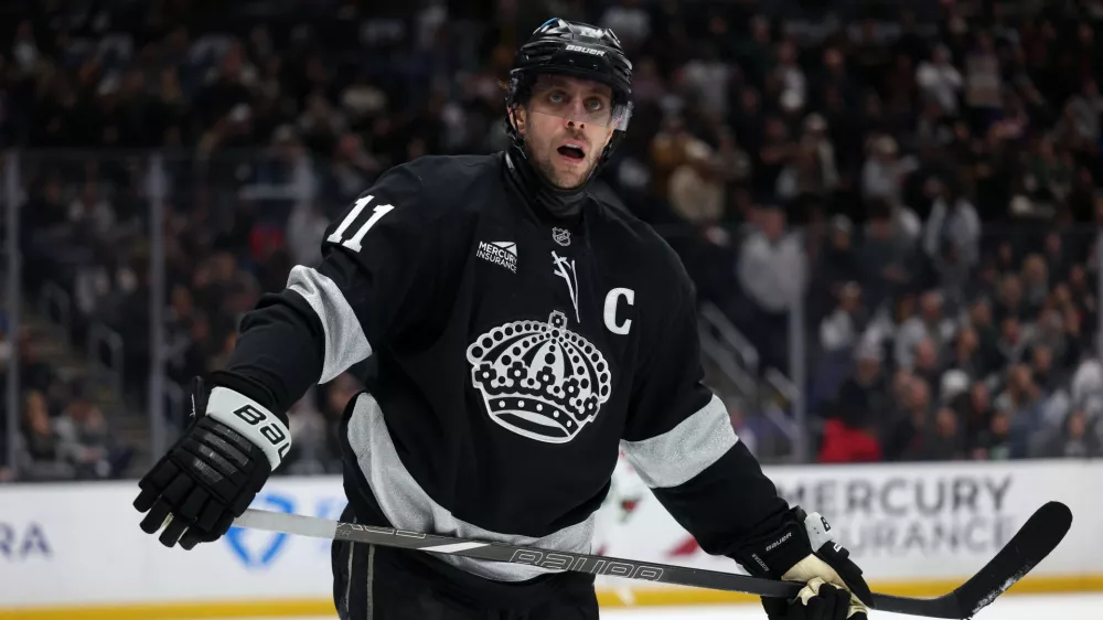 Jan 3, 2026; Los Angeles, California, USA; Los Angeles Kings center Anze Kopitar (11) looks on during overtime against the Minnesota Wild at Crypto.com Arena. Mandatory Credit: Kiyoshi Mio-Imagn Images
