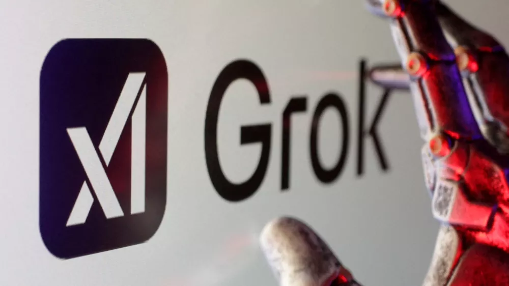 FILE PHOTO: xAI and Grok logos are seen in this illustration created on February 16, 2025. REUTERS/Dado Ruvic/Illustration/File Photo