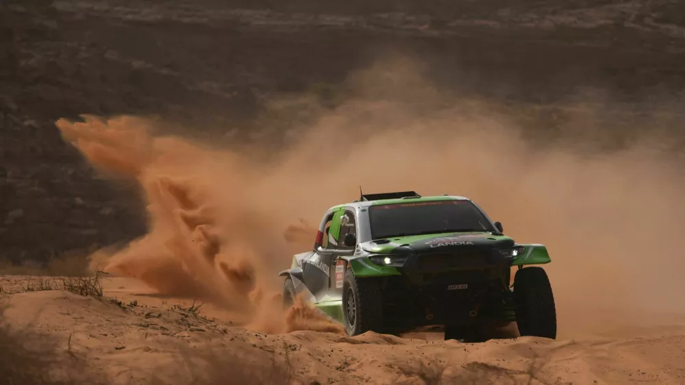 Driver Eryk Goczal and co-driver Szymon Gospodarczyk compete during the third stage of the Dakar Rally with a start and finish in Alula, Saudi Arabia, Tuesday, Jan. 6, 2026. (AP Photo/Thibault Camus)