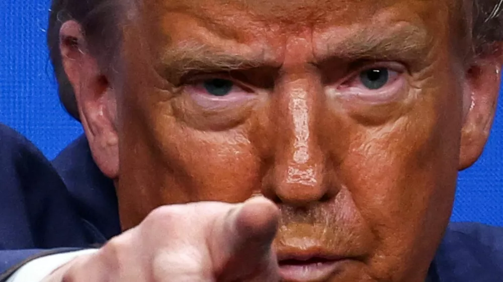 U.S. President Donald Trump gestures during a press conference at a NATO summit in The Hague, Netherlands June 25, 2025. REUTERS/Yves Herman   TPX IMAGES OF THE DAY