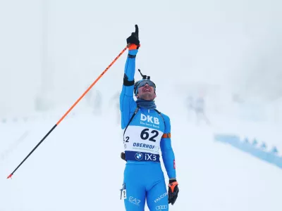 Biathlon - Biathlon World Cup - Oberhof, Germany - January 8, 2026 Italy's Tommaso Giacomel celebrates after winning the men's 10km sprint REUTERS/Matthew Childs