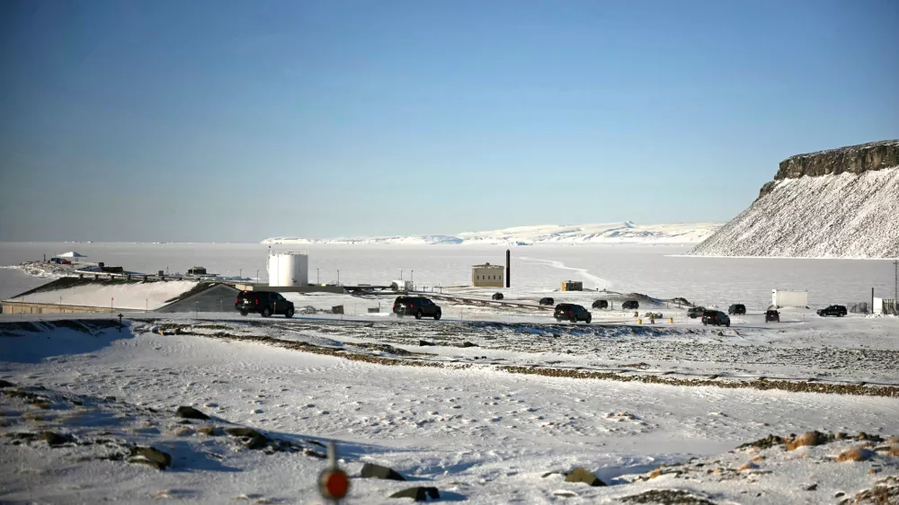 FILE - The motorcade of Vice President JD Vance travels through Pituffik Space Base during a tour, March 28, 2025, in Greenland. (Jim Watson/Pool via AP, File)