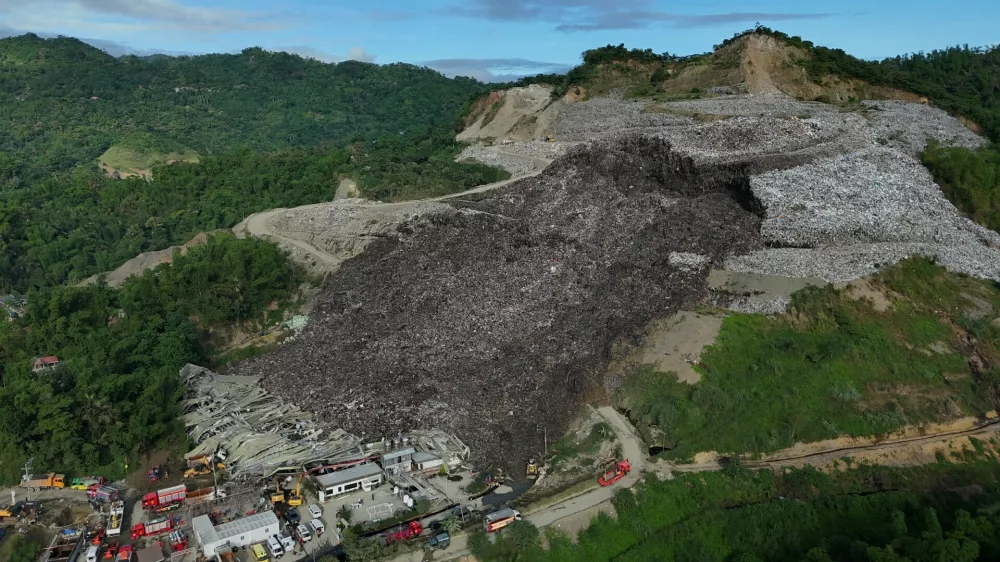An aerial view of a huge mound of garbage that collapsed at a waste segregation facility in Binaliw, Cebu city on Friday, Jan. 9, 2026. (AP Photo/Jacqueline Hernandez)