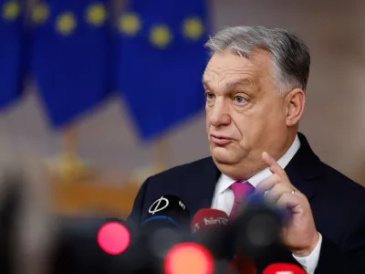 Hungary's Prime Minister Viktor Orban speaks with the media as he arrives for the EU Summit in Brussels, Thursday, Dec. 18, 2025. (AP Photo/Geert Vanden Wijngaert)