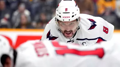 Washington Capitals left wing Alex Ovechkin (8) waits for the puck to be dropped during a face-off in the first period of an NHL hockey game against the Nashville Predators, Sunday, Jan. 11, 2026, in Nashville, Tenn. (AP Photo/Mark Humphrey)