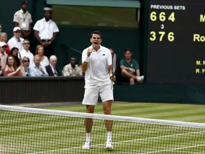 Britain Tennis - Wimbledon - All England Lawn Tennis & Croquet Club, Wimbledon, England - 8/7/16 Canada's Milos Raonic celebrates during his match against Switzerland's Roger Federer REUTERS/Stefan Wermuth