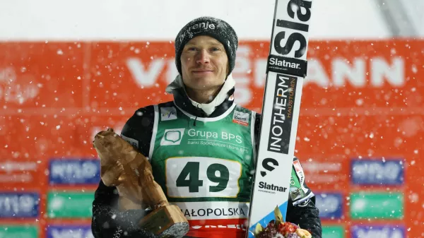 Ski Jumping - Ski Jumping World Cup - Zakopane, Poland - January 11, 2026 Slovenia's Anze Lanisek poses with the trophy after winning the Men's Individual HS140 REUTERS/Kacper Pempel