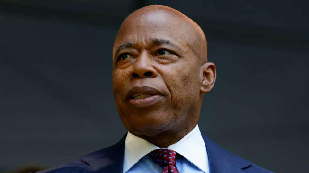 FILE PHOTO: New York Mayor Eric Adams arrives for a ceremony marking the 24th anniversary of the September 11, 2001 attacks on the World Trade Center at the 9/11 Memorial and Museum in the Manhattan borough of New York City, U.S., September 11, 2025. REUTERS/Kylie Cooper/File Photo