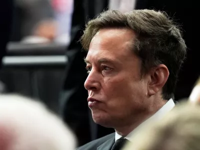 FILE - Elon Musk attends a memorial for conservative activist Charlie Kirk, Sunday, Sept. 21, 2025, at State Farm Stadium in Glendale, Ariz. (AP Photo/Julia Demaree Nikhinson, File)