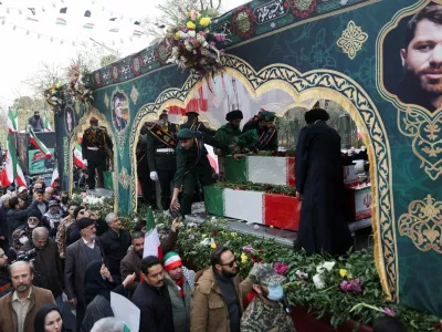 People attend the funeral of the security forces who were killed in the protests that erupted over the collapse of the currency's value in Tehran, Iran, January 14, 2026. Majid Asgaripour/WANA (West Asia News Agency) via REUTERS ATTENTION EDITORS - THIS PICTURE WAS PROVIDED BY A THIRD PARTY   TPX IMAGES OF THE DAY
