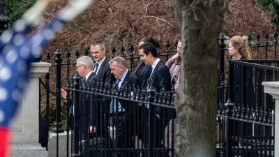 Denmark's Foreign Minister Lars Løkke Rasmussen, third from left, Greenland's Foreign Minister Vivian Motzfeldt, not shown, and their delegations leave the Old Eisenhower Executive Office Building on the grounds of the White House, Wednesday, Jan. 14, 2026, in Washington. (AP Photo/Alex Brandon)
