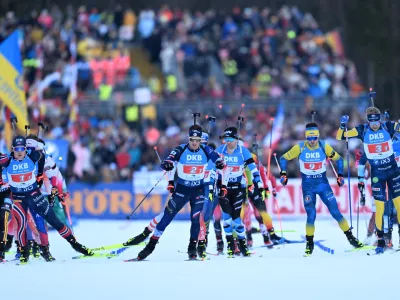 Skiers start a Biathlon, men's World Cup, 4 x 7.5 km relay race, in Ruhpolding, Germany, Thursday, Jan. 15, 2026. (Sven Hoppe/dpa via AP)