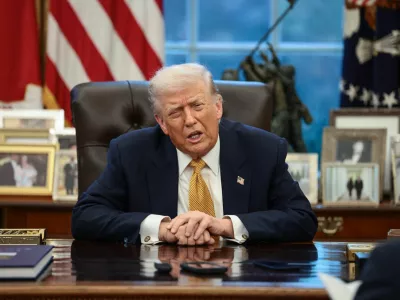 U.S. President Donald Trump is interviewed by Reuters White House correspondent Steve Holland (not pictured) during an exclusive interview in the Oval Office in the White House in Washington, D.C., U.S., January 14, 2026. REUTERS/Evelyn Hockstein
