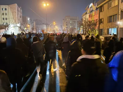 In this photo obtained by The Associated Press, Iranians attend an anti-government protest in Tehran, Iran, Thursday, Jan. 8, 2026. (UGC via AP)
