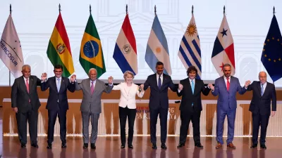 Panama's President Jose Raul Mulino, from left, Bolivian President Rodrigo Paz, European Council President Antonio Costa, European Commission President Ursula von der Leyen, Paraguay's President Santiago Pena, Argentina's President Javier Milei, Uruguay's President Yamandu Orsi and Brazilian Minister of Foreign Affairs Mauro Vieira, pose for a group photo during a meeting to sign a free trade deal between the European Union and Mercosur in Asuncion, Paraguay, Saturday, Jan. 17, 2026. (AP Photo/Jorge Saenz)