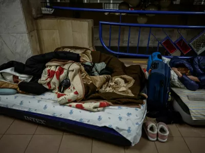 People sleep as they take shelter inside a metro station during a Russian missile and drone strike, amid Russia's attack on Ukraine, in Kyiv, Ukraine January 20, 2026. REUTERS/Alina Smutko
