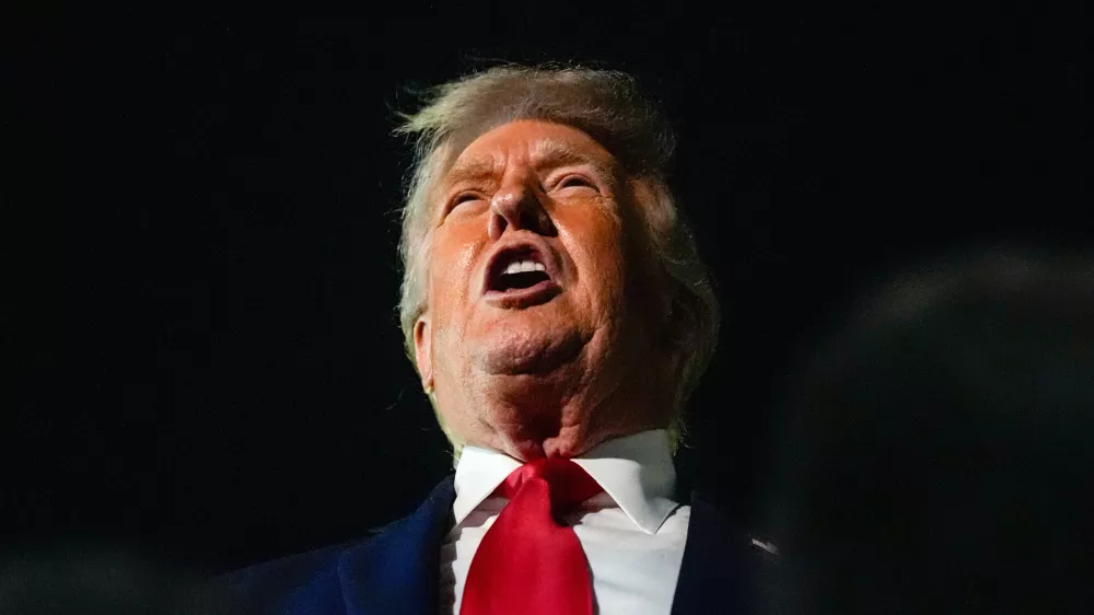 President Donald Trump speaks with reporters after arriving at&nbsp;Palm Beach International Airport, Monday, Jan. 19, 2026, in West Palm Beach, Fla. (AP Photo/Julia Demaree Nikhinson)