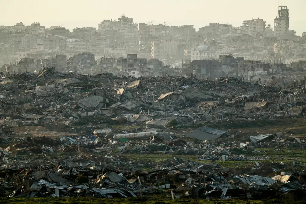 Destroyed buildings in Gaza, as seen from Israel, January 20, 2026. REUTERS/Amir Cohen