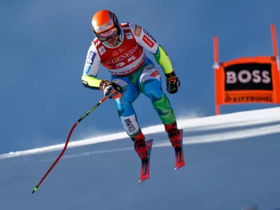 Slovenia's Miha Hrobat speeds down the course during a men's World Cup super-G, in Kitzbuehel, Friday, Jan. 23, 2026. (AP Photo/Gabriele Facciotti)