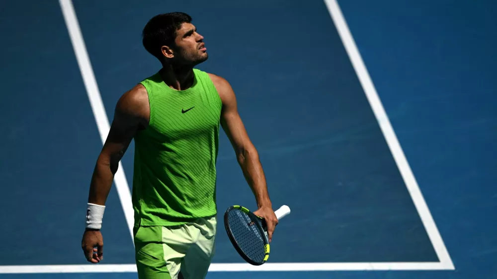 Tennis - Australian Open - Melbourne Park, Melbourne, Australia - January 25, 2026 Spain's Carlos Alcaraz reacts during his fourth round match against Tommy Paul of the U.S. REUTERS/Jaimi Joy