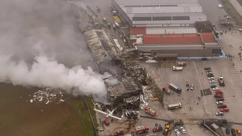 A drone view of emergency personnel working at the site of a biscuit factory, following a fire which left victims and missing people, the fire brigade said, near Trikala, Greece, January 26, 2026. REUTERS/Stringer