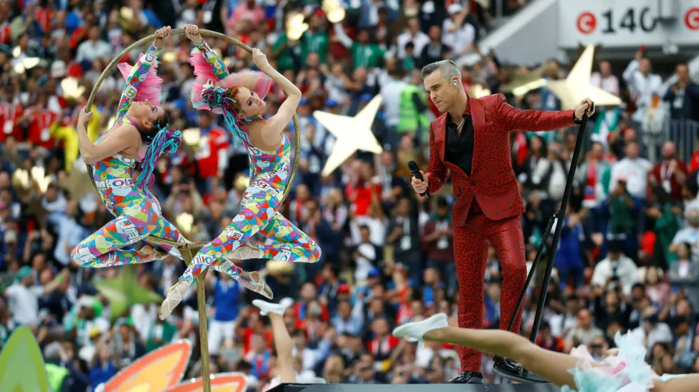 Soccer Football - World Cup - Opening Ceremony - Luzhniki Stadium, Moscow, Russia - June 14, 2018 Robbie Williams performs during the opening ceremony  REUTERS/Kai Pfaffenbach