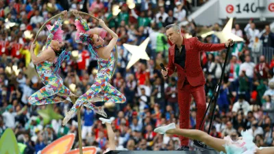 Soccer Football - World Cup - Opening Ceremony - Luzhniki Stadium, Moscow, Russia - June 14, 2018 Robbie Williams performs during the opening ceremony  REUTERS/Kai Pfaffenbach