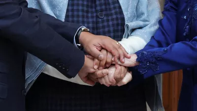 European Council President Antonio Costa, European Commission President Ursula von der Leyen and Indian Prime Minister Narendra Modi hold hands as they pose during a photo opportunity ahead of their meeting at the Hyderabad House in New Delhi, India, January 27, 2026. REUTERS/Altaf Hussain