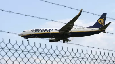 A Ryanair aircraft comes into land at East Midlands Airport, central England July 28, 2008. Irish airline Ryanair warned on Monday it may make its first loss since 1989 because it will respond to high fuel costs and the threat of recession by cutting fares. REUTERS/Darren Staples  (BRITAIN)