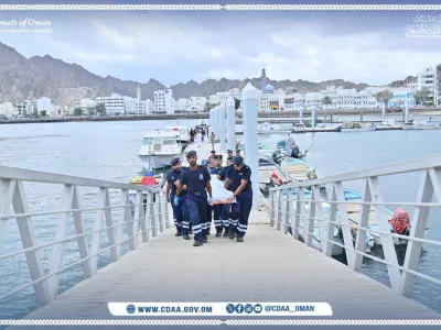 Rescue members carry a body following the report of French tourists being killed when a boat capsized off the coast of Oman, according to the Omani police, in Muttrah, Oman, in this handout image relased on January 27, 2026. Civil Defence and Ambulance Authority - Sultanate of Oman/Handout via REUTERS  THIS IMAGE HAS BEEN SUPPLIED BY A THIRD PARTY. MANDATORY CREDIT. DO NOT OBSCURE LOGO.
