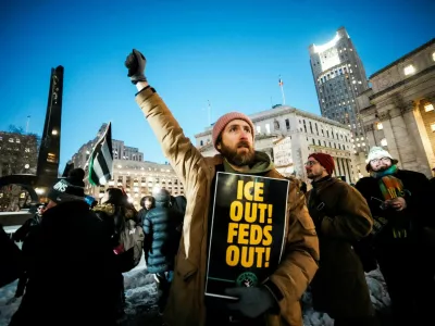 Demonstrators take part in a vigil and protest over the fatal shooting of a man identified as Alex Pretti by federal immigration agents in Minneapolis, Minnesota, in New York City, U.S., January 27, 2026. REUTERS/Eduardo Munoz   TPX IMAGES OF THE DAY