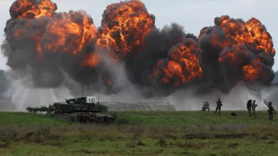 Smoke billows from a blast near Polish Abrams tank as Polish forces with NATO soldiers hold military exercises 'Iron Defender' at a military range in Wierzbiny near Orzysz, Poland, September17, 2025. REUTERS/Kacper Pempel