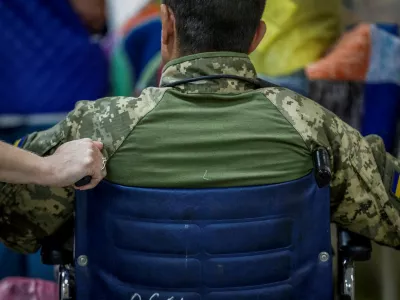 A Ukrainian serviceman, wounded during fighting with Russian forces, who is a patient of the Mechnykov Hospital, prepares for being transferred, amid Russia's attack on Ukraine, in Dnipro, Ukraine, May 14, 2025. REUTERS/Alina Smutko