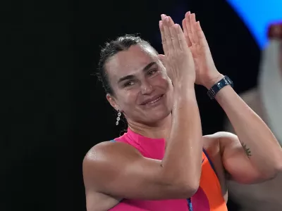 Aryna Sabalenka of Belarus celebrates after defeating Elina Svitolina of Ukraine in their semifinal match at the Australian Open tennis championship in Melbourne, Australia, Thursday, Jan. 29, 2026. (AP Photo/Aaron Favila)