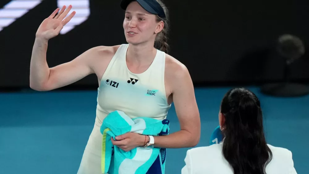 Elena Rybakina of Kazakhstan waves after winning her semifinal match against Jessica Pegula of the U.S. at the Australian Open tennis championship in Melbourne, Australia, Thursday, Jan. 29, 2026. (AP Photo/Dar Yasin)