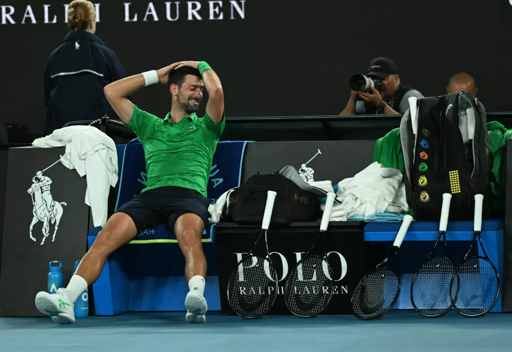 Tennis - Australian Open - Melbourne Park, Melbourne, Australia - January 31, 2026 Serbia's Novak Djokovic celebrates winning his semi final match against Italy's Jannik Sinner REUTERS/Jaimi Joy
