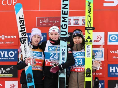 Ski Jumping - FIS Ski Jumping World Cup - Willingen, Germany - January 31, 2026 Norway's Eirin Maria Kvandal celebrates after winning the women's individual HS147 with second placed Slovenia's Nika Prevc and third placed Japan's Nozomi Maruyama REUTERS/Leon Kuegeler