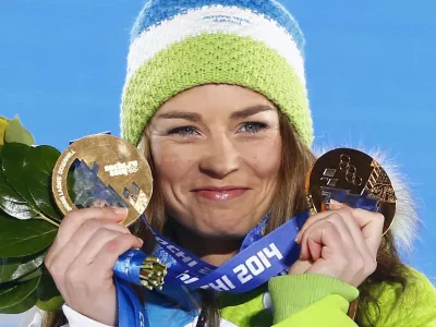 Gold medallist Slovenia's Tina Maze poses during the victory ceremony for the women's alpine skiing giant slalom event at the 2014 Sochi Winter Olympics February 19, 2014. REUTERS/Shamil Zhumatov (RUSSIA - Tags: SPORT SKIING OLYMPICS)