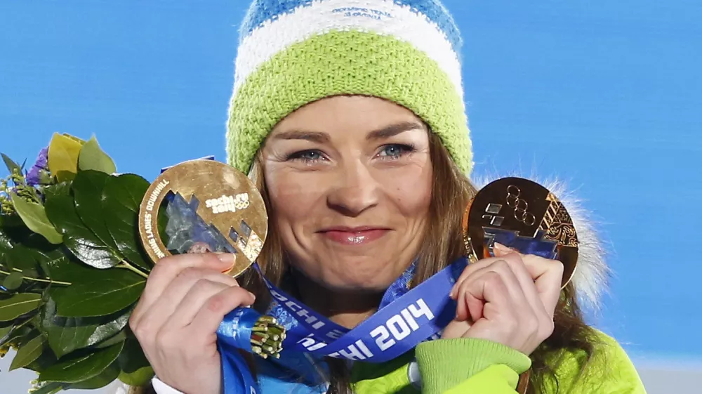 Gold medallist Slovenia's Tina Maze poses during the victory ceremony for the women's alpine skiing giant slalom event at the 2014 Sochi Winter Olympics February 19, 2014. REUTERS/Shamil Zhumatov (RUSSIA - Tags: SPORT SKIING OLYMPICS)