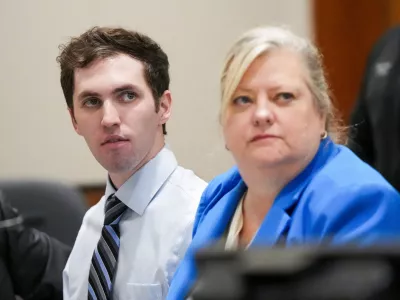 FILE PHOTO: Tyler Robinson, suspect in the fatal shooting of Charlie Kirk, sits beside defense attorney Kathryn Nester during a hearing in 4th District Court in Provo, Utah, U.S., on January 16, 2026. Bethany Baker/Pool via REUTERS/File Photo