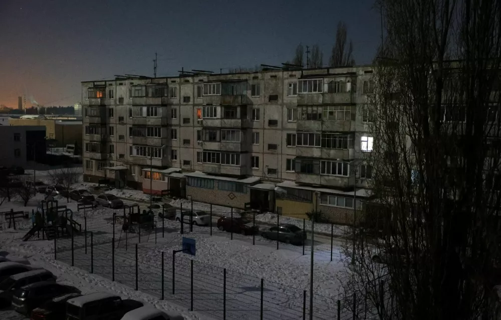 A residential building during a power blackout, that according to local authorities was caused by a recent Ukrainian missile attack targeting the regional energy system, amid the Russia-Ukraine military conflict in Belgorod, Russia, February 3, 2026. REUTERS/Stringer