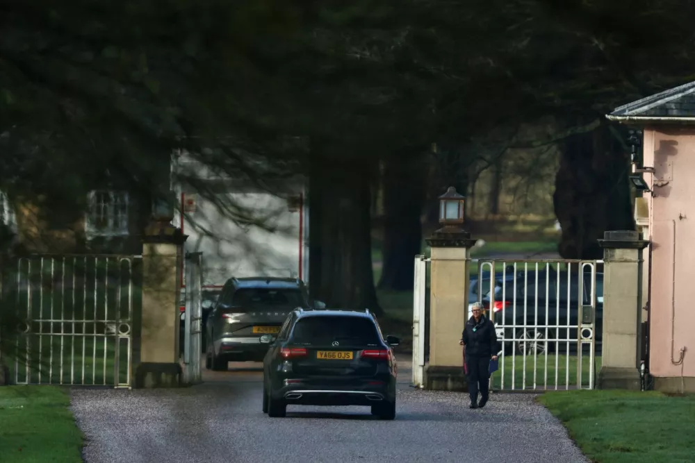 A removal van drives by an entrance to Royal Lodge, a property on the estate surrounding Windsor Castle that Andrew Mountbatten‑Windsor, the younger brother of Britain's King Charles, is reported to have moved out of, as pressure builds on him to give evidence after the U.S. Justice Department released more records tied to the late financier and convicted sex offender Jeffrey Epstein, in Windsor, Britain, February 4, 2026. REUTERS/Toby Shepheard