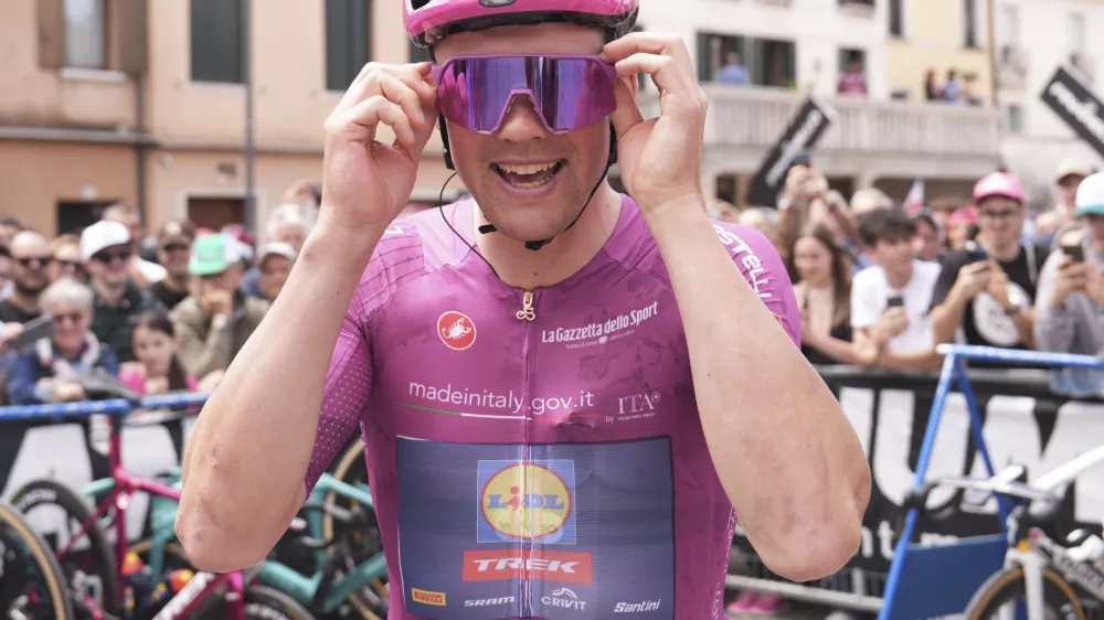 Denmark's Mads Pedersen smiles at the start of stage 14 of the Giro d'Italia cycling race from Treviso to Nova Gorica/Gorizia, Italy, Saturday, May 24, 2025. (Massimo Paolone/LaPresse via AP)