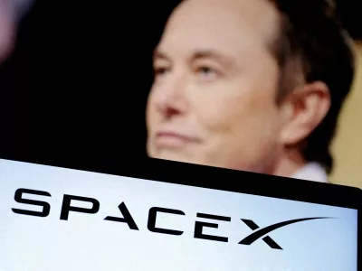 FILE PHOTO: SpaceX's logo and an Elon Musk photo are seen in this illustration created on December 19, 2022. REUTERS/Dado Ruvic/Illustration/File Photo